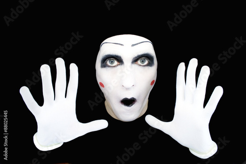 Portrait of the mime in white gloves