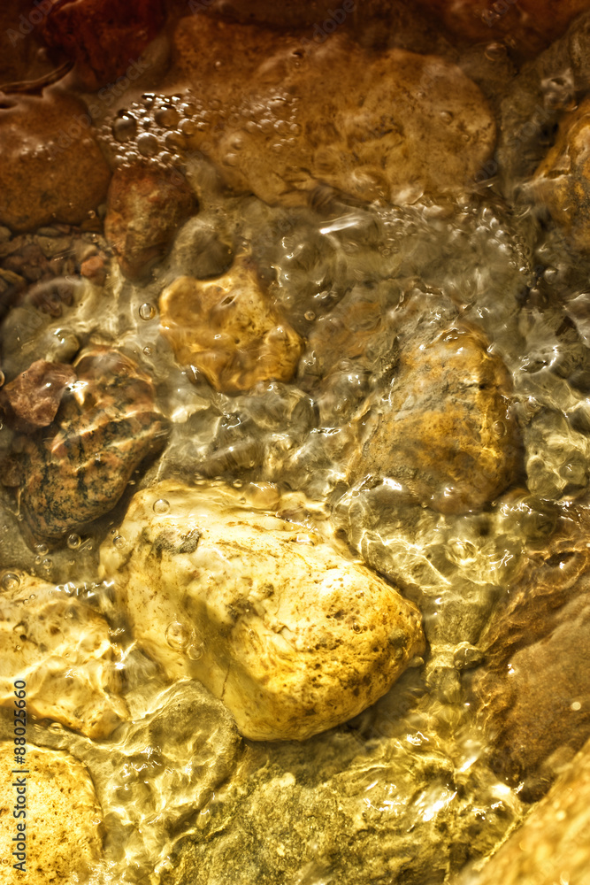 Water flowing in stones