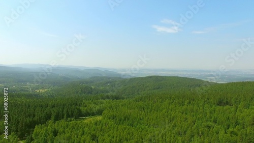 Aerial footage: Flying over mountain forest. Poland.