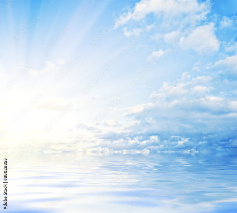sky and the sun reflected in water sky and the sun reflected in water