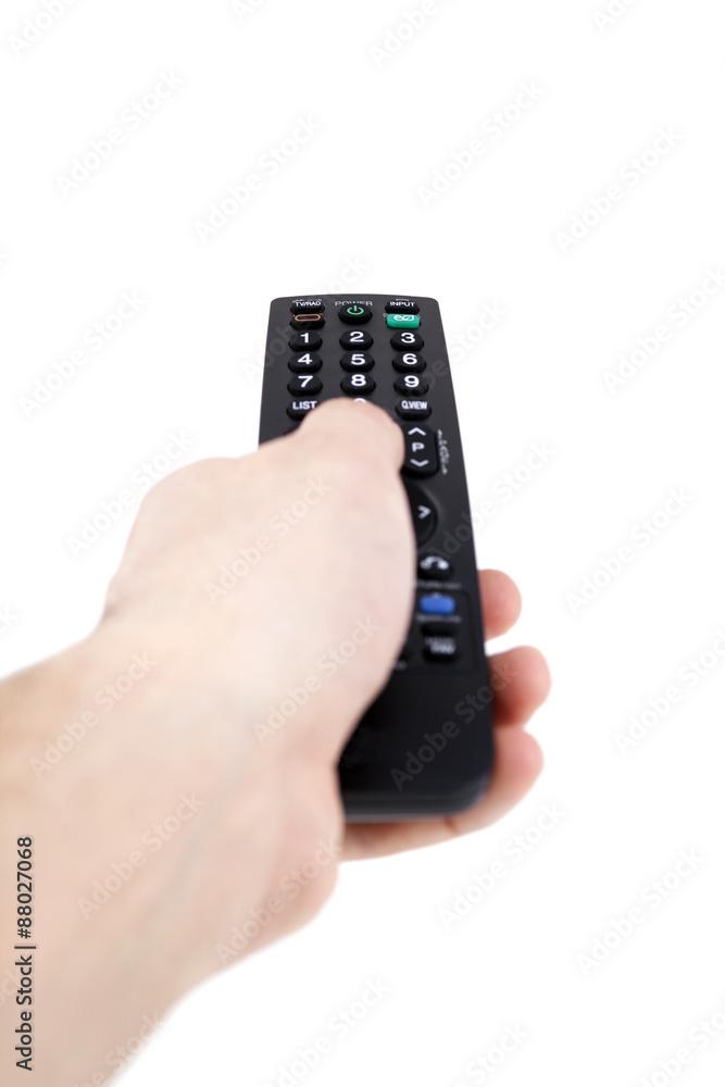 Hand holding television remote Hand holding television remote