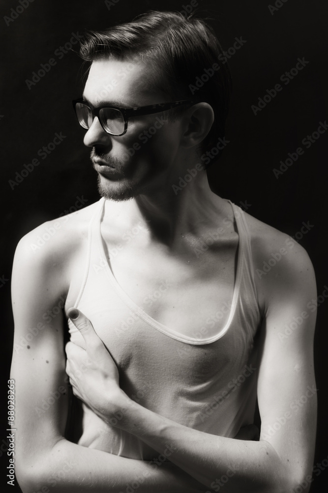 handsome young adult man in glasses handsome young adult man in glasses