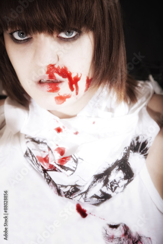 young woman with  bloodstained face