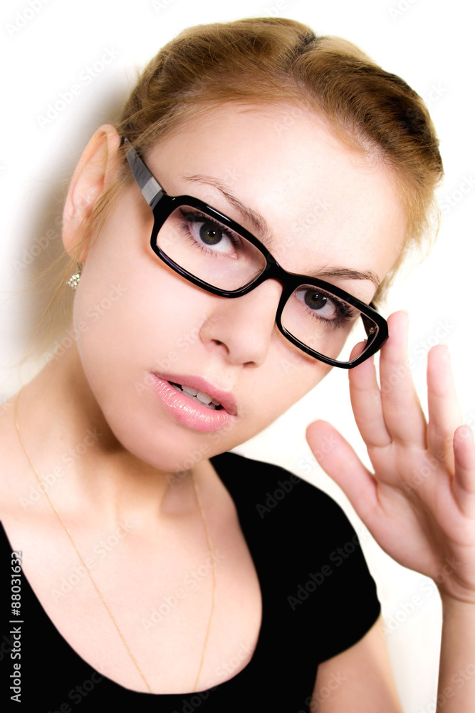 Portrait of cuter girl in points on a light background