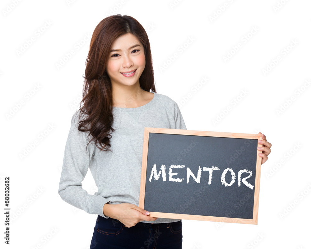 Asian woman hold with black board and showing a word mentor Asian woman hold with black board and showing a word mentor