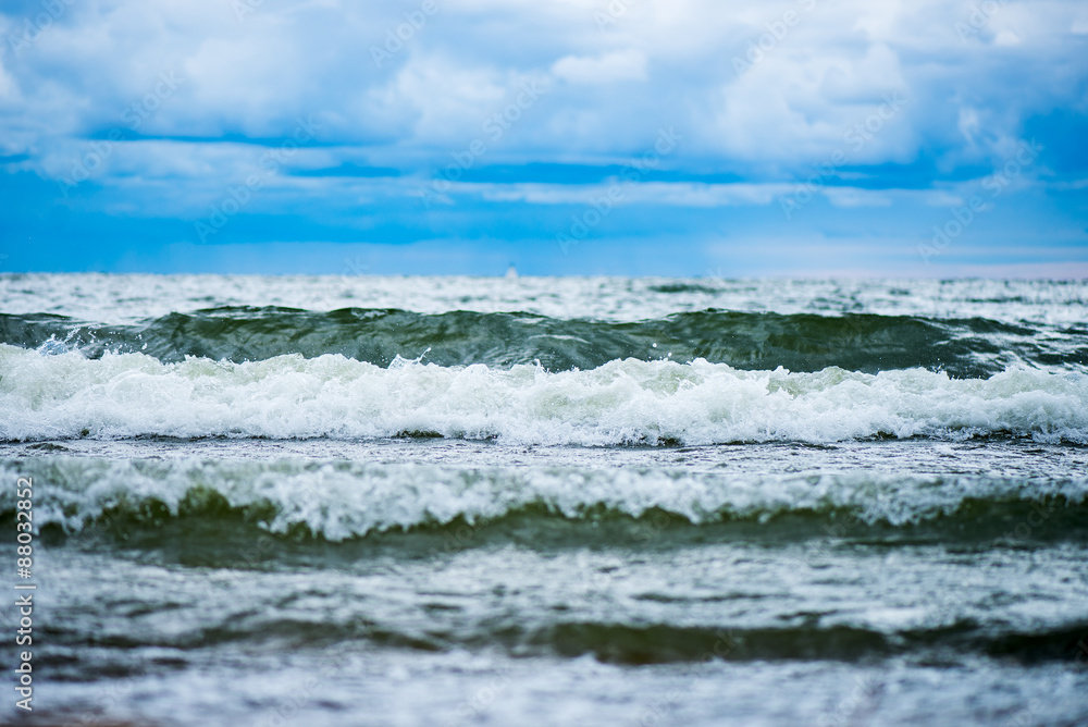 Beautiful Waves in the Sea and Blue Cloudy Sky