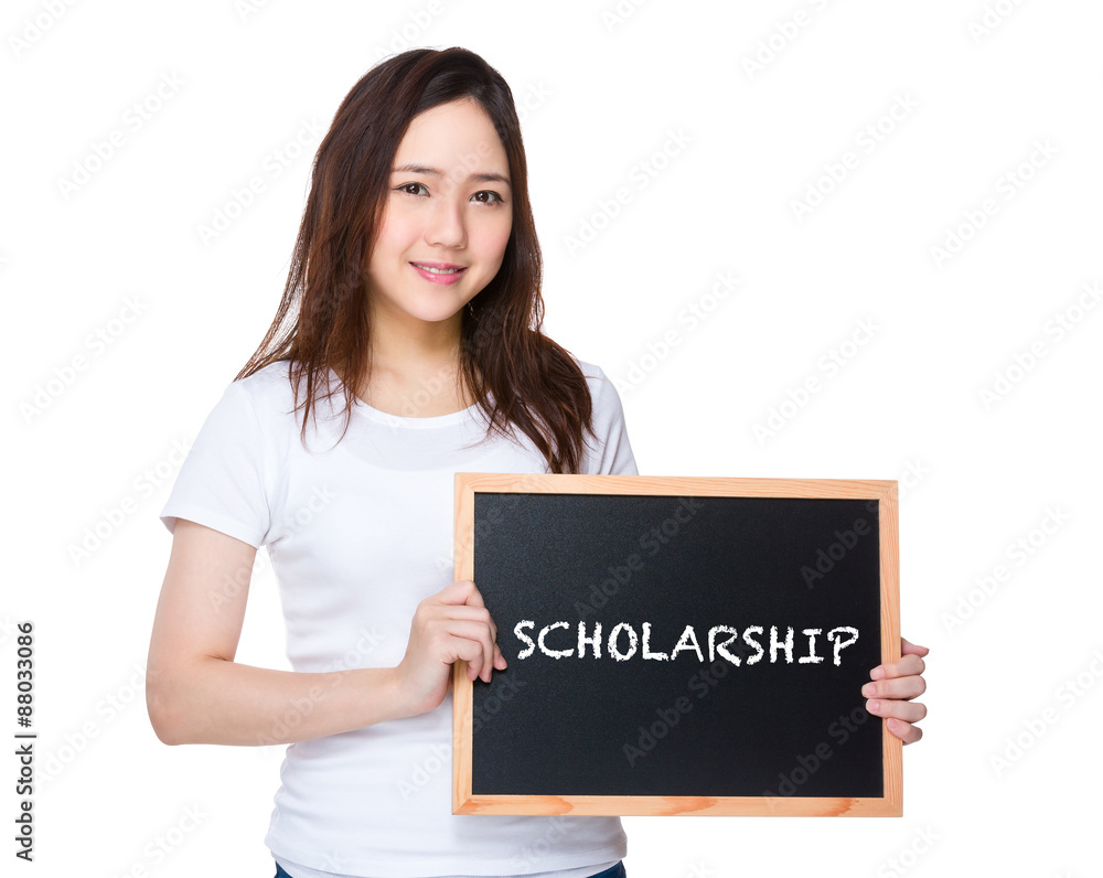 Young woman hold with blackboard showing a word scholarship Young woman hold with blackboard showing a word scholarship