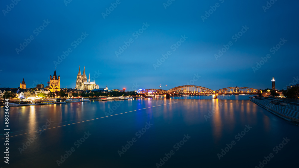 Night View Of Cologne Cathedral And Hohenzollern Bridge, Germany