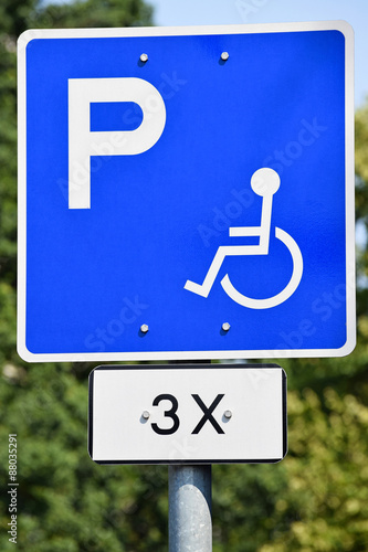 Disabled parking lot sign