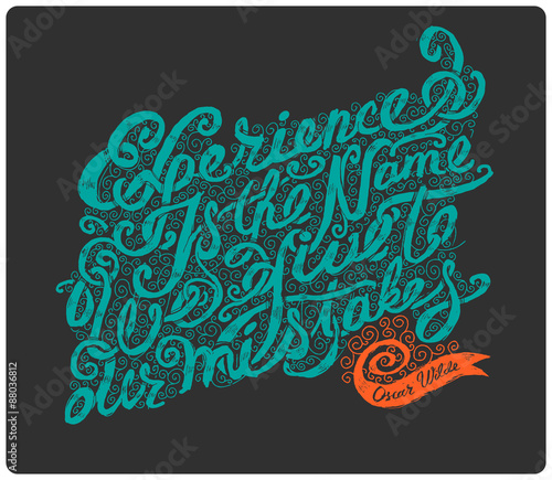 Calligraphic hand drawn type. "Experience is the name we give to our mistakes". Oscar Wilde quote. On dark background. 