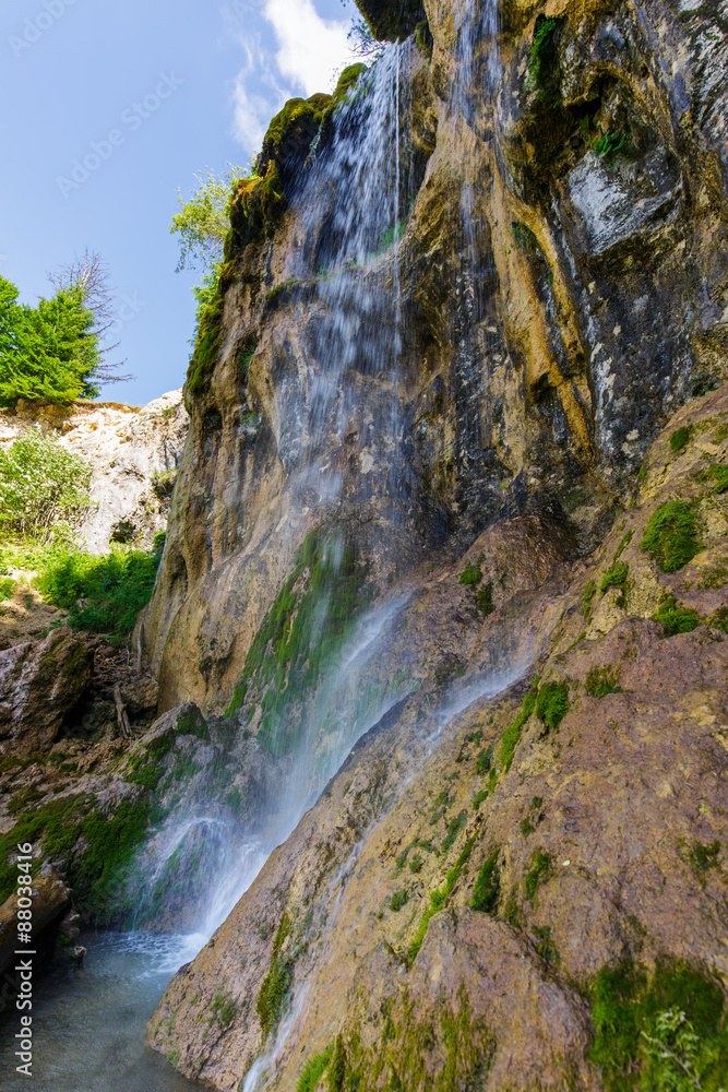 Obraz premium Beautiful mountain waterfall