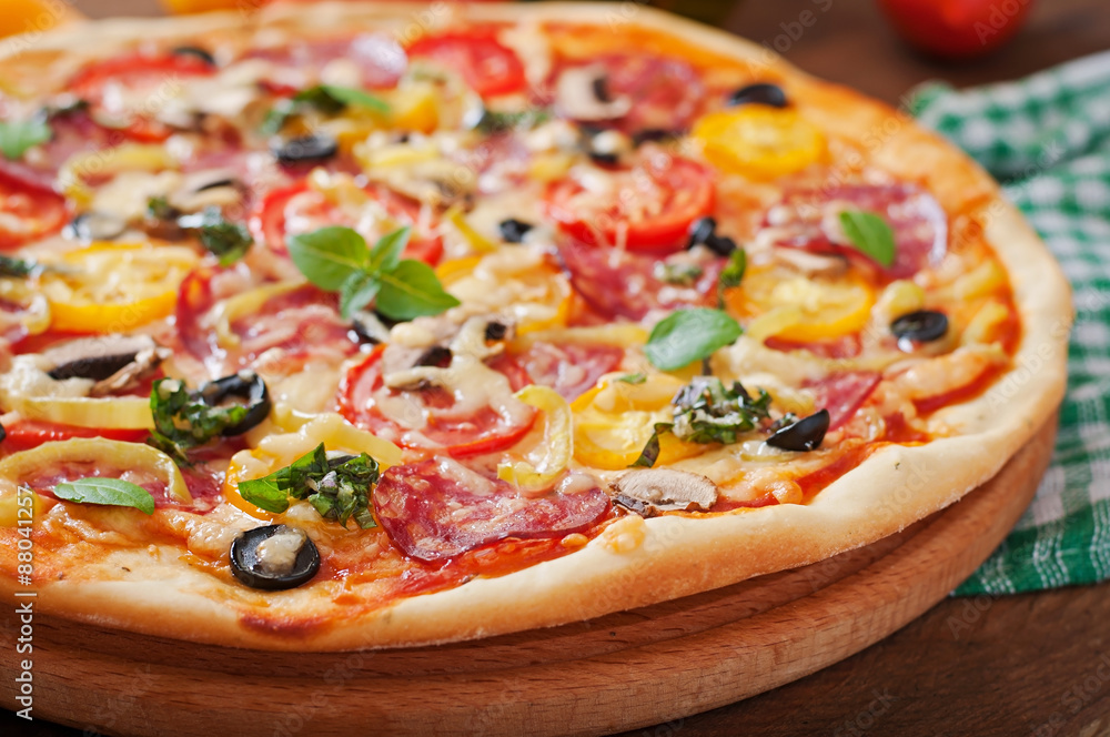 Pizza with salami, tomato, cheese and olives Pizza with salami, tomato, cheese and olives