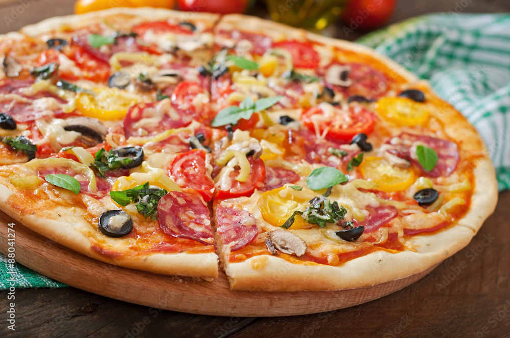 Pizza with salami, tomato, cheese and olives Pizza with salami, tomato, cheese and olives