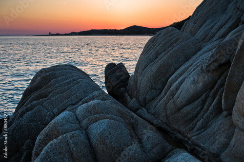 Sea rocks at sunset, west coast of peninsula Sithonia, Chalkidiki photo