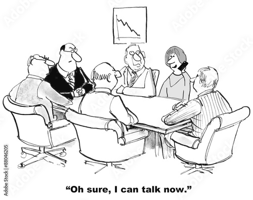 Business cartoon showing people conducting a meeting and woman taking a phone call and saying, 'Oh sure, I can talk now'. photo