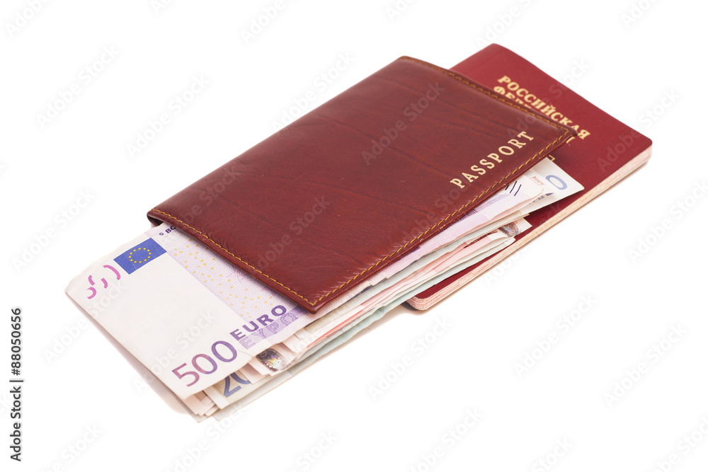Russian passports and Euro money on white background Russian passports and Euro money on white background