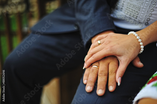 hands of couple with married rings