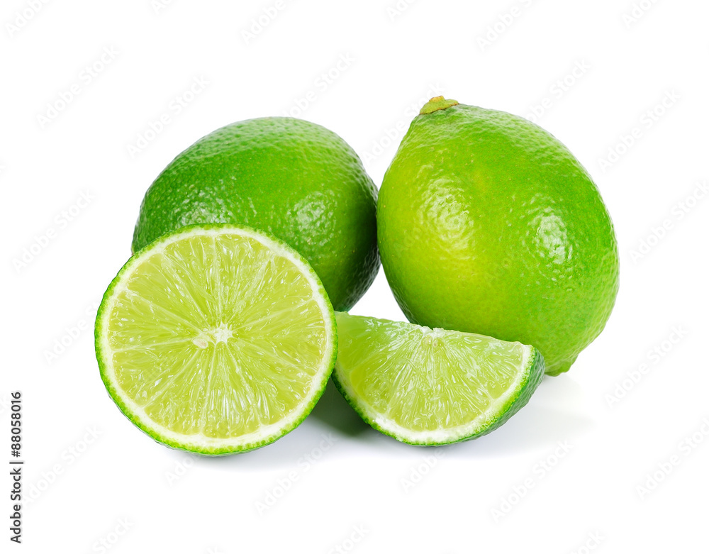 Limes with slices isolated on white background. Limes with slices isolated on white background.