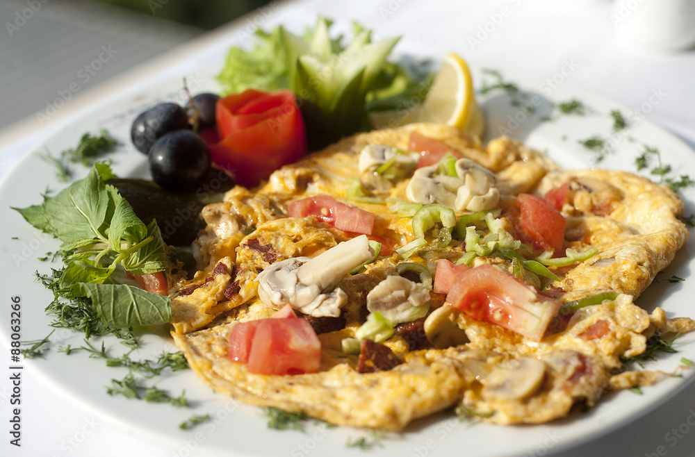 Omelet with sauteed mushrooms and vegetables Omelet with sauteed mushrooms and vegetables
