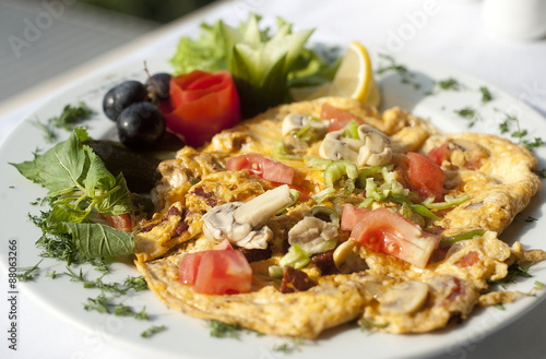 Omelet with sauteed mushrooms and vegetables