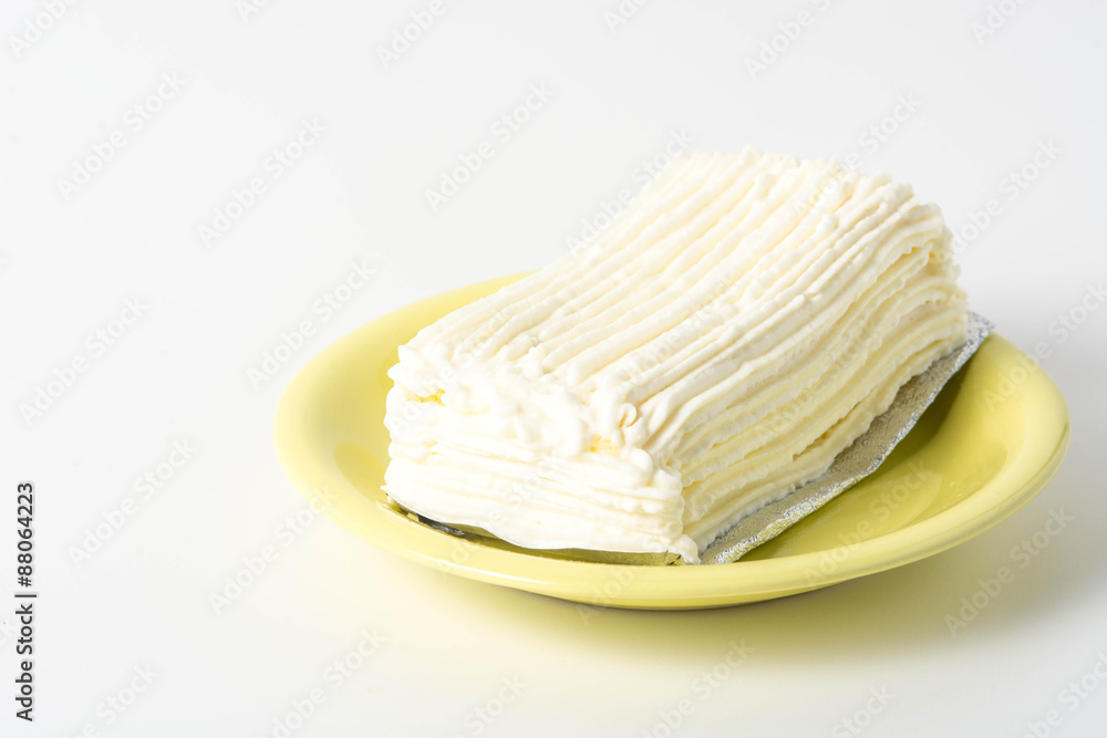 white chocolate cake on green plate