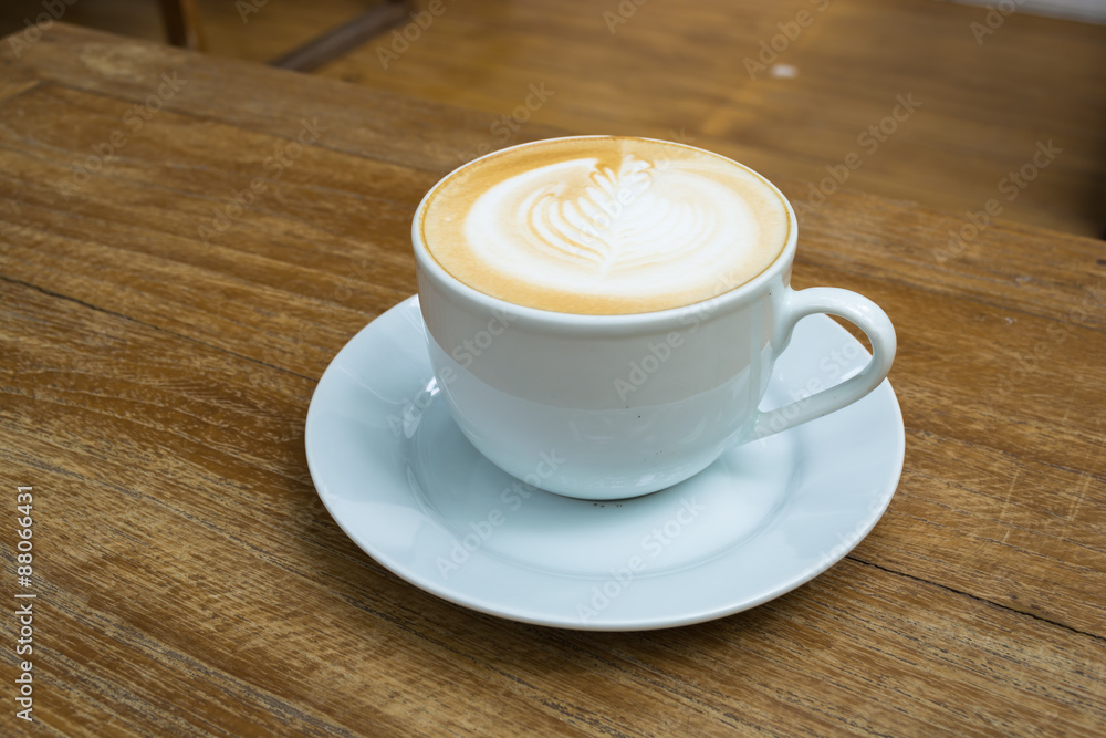 latte on wooden table brown color latte on wooden table brown color