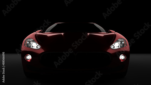 Computer generated image of a luxury sports car, studio setup, dark background. © supradumnezeu