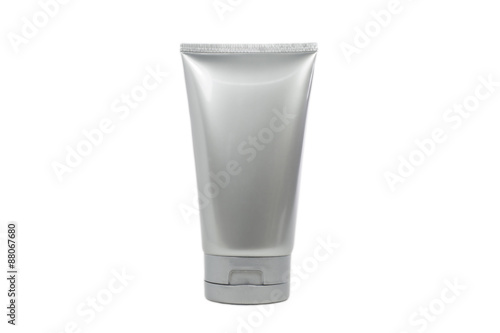 Silver cosmetic tube with transparent cap isolated and clipping