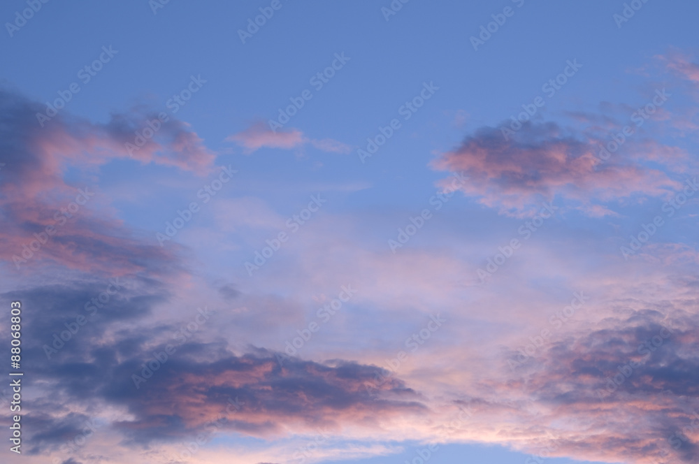 blue sky with red evening clouds