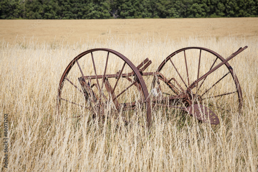 Agricultural machines for harvesting in a field in Provence Agricultural machines for harvesting in a field in Provence