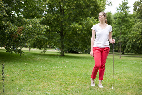 a young woman on the golf course