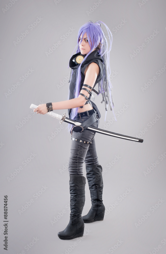 Female fantasy warrior / Female warrior with sword isolated on the gray background Female fantasy warrior / Female warrior with sword isolated on the gray background