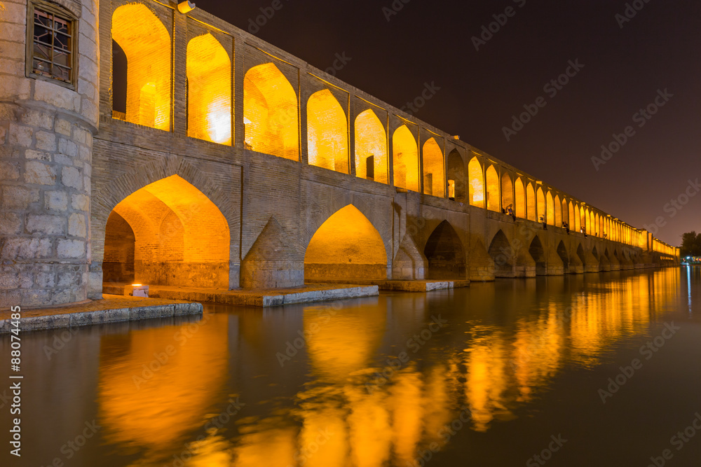 ISFAHAN, IRAN - APRIL 28, 2015: unidentified people resting in t