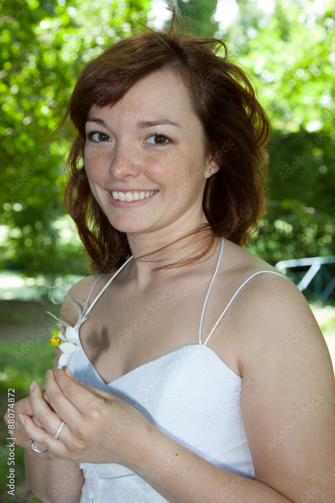 Young woman with a white dress on the country Young woman with a white dress on the country