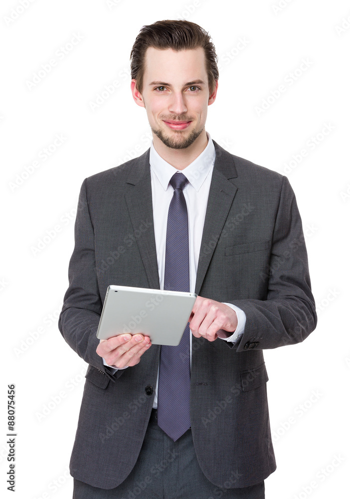 Young businessman use of digital tablet Young businessman use of digital tablet