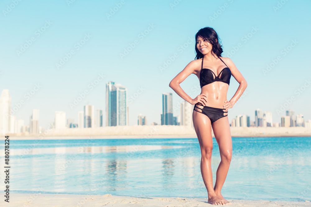 Sexy woman on Dubai city beach in vacation Sexy woman on Dubai city beach in vacation