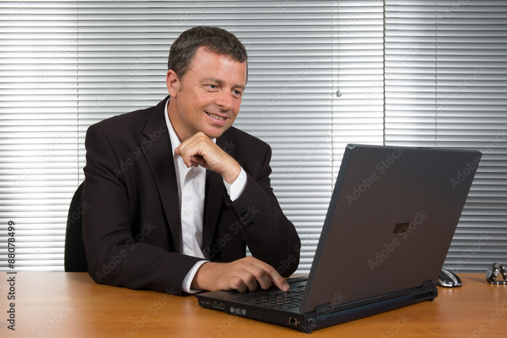 Business man at work at his office Business man at work at his office