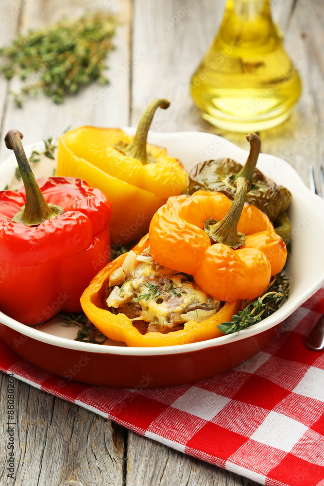 Red and yellow peppers stuffed with meat, rice and vegetables