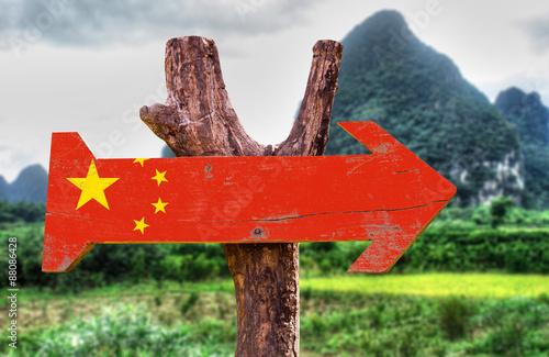 China flag wooden sign with rural background photo