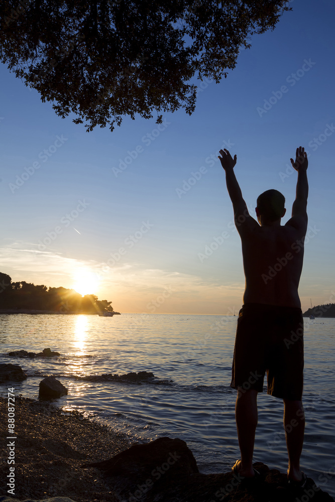 Man standing on shore