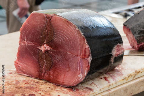 Fresh tuna fish cut in pieces ready for sale in a fish market