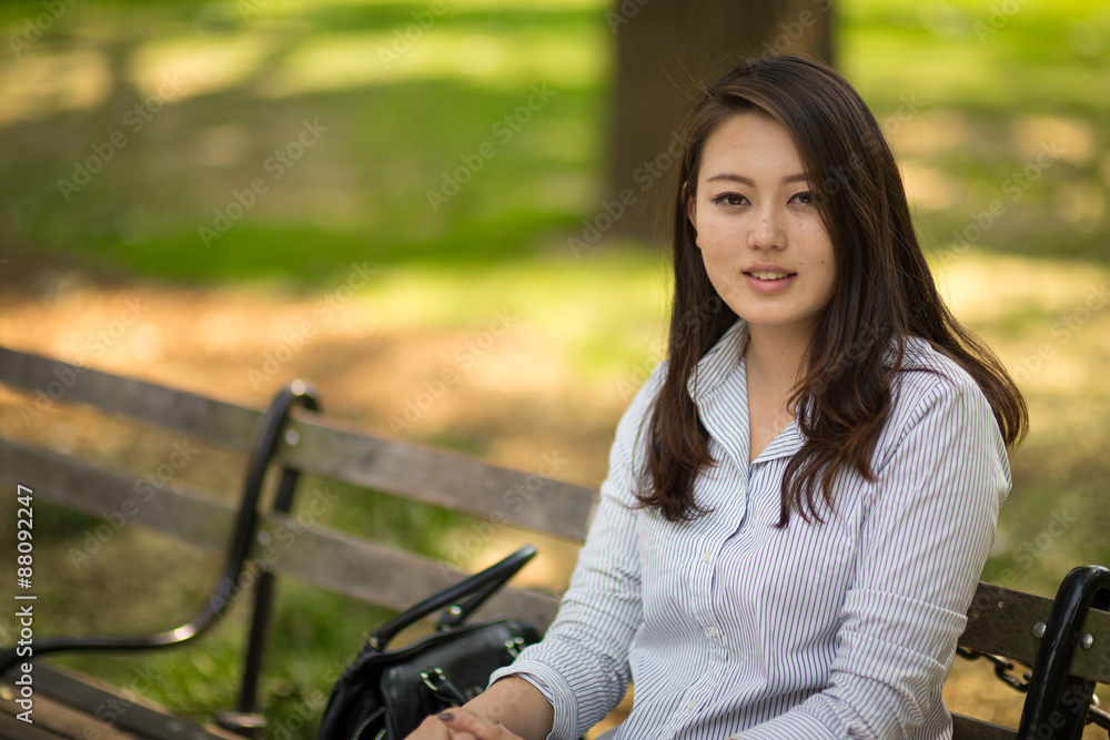 Young Asian woman in city smile happy face portrait Young Asian woman in city smile happy face portrait