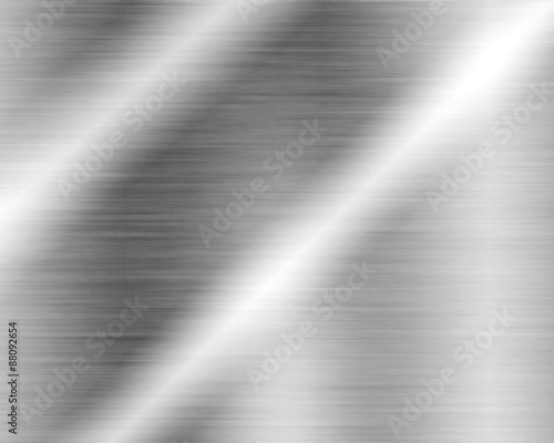 Metal background or texture of brushed steel plate with reflections Iron plate