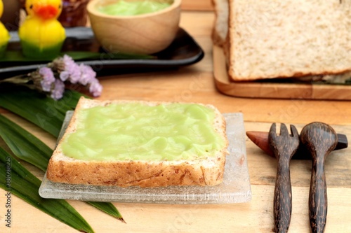 Bread with green custard and fresh milk.