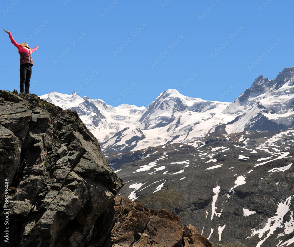 Girl on the top in Pennine Alps,Switzerland