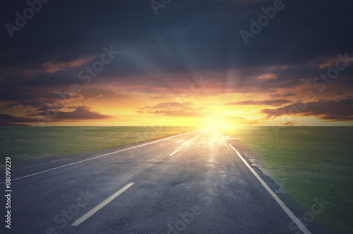 Sunrise above road