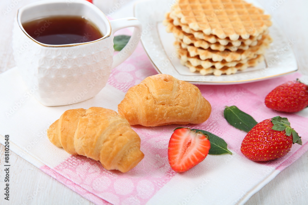 Tea and ripe strawberries Tea and ripe strawberries