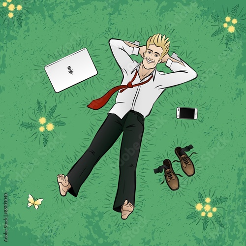 A Little Bit of Freedom. Young businessman relaxing on grassplot