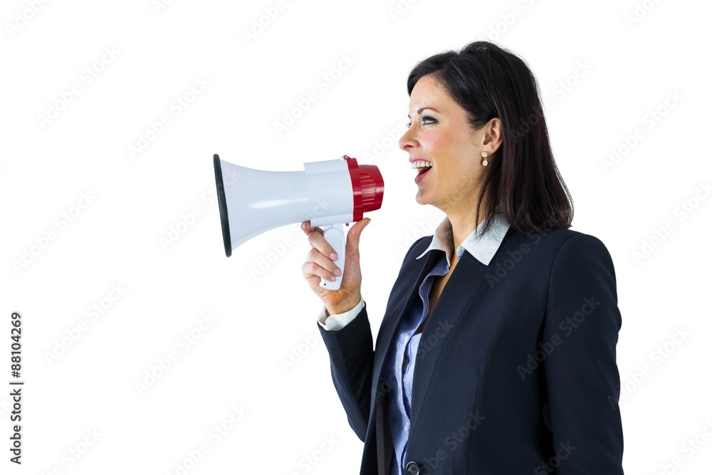 Businesswoman shouting through a megaphone Businesswoman shouting through a megaphone