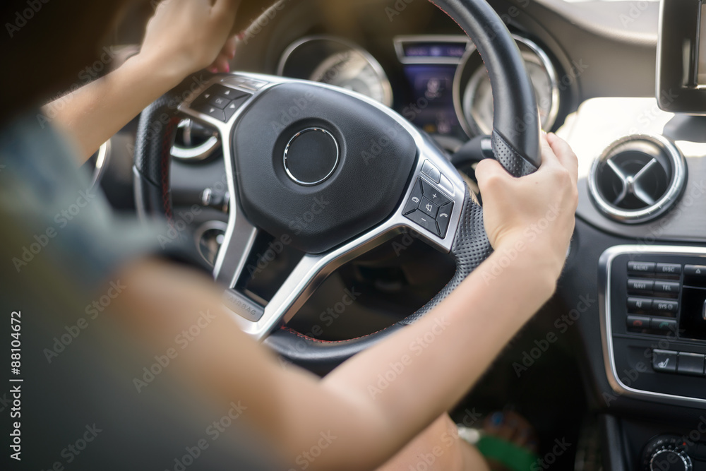 Female driving car. Selective focus.